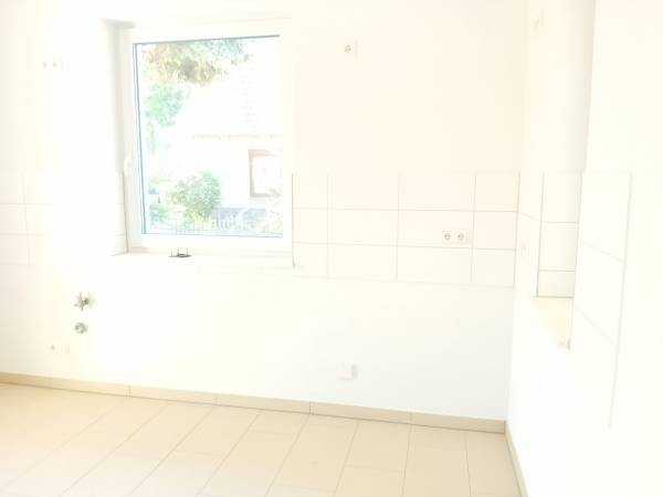 Küche mit Zugang zur Terrasse